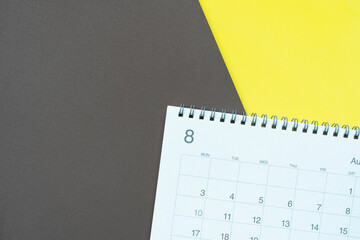close up of calendar on the colorful table background, planning for business meeting or travel planning concept
