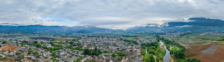Fototapeta premium Panoramic aerial view of Shaxi Ancient Town in Jianchuan County, Dali, Yunnan Province