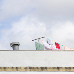 Clothes hanging on a clothesline, drying on a roof in the sun. Spain, Andalusia, Jeres de la...
