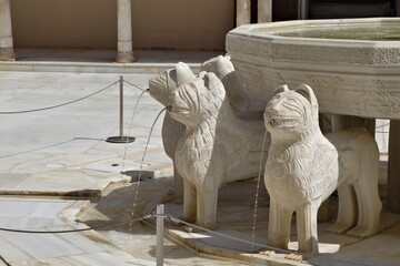 detail of the fountain of the lions in the alhambra of granada