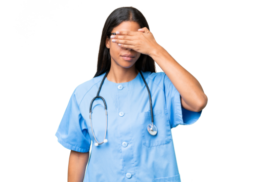 Young African american nurse woman over isolated background covering eyes by hands. Do not want to see something