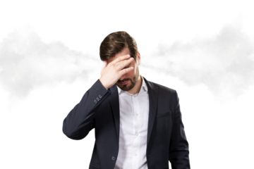 Businessman in suit holding head in frustration with steam effect from ears, clean white background, concept of stress and business burnout