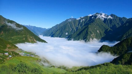 Mountain Range and Cloudscape Lush Green Valley under a Vivid Blue Sky