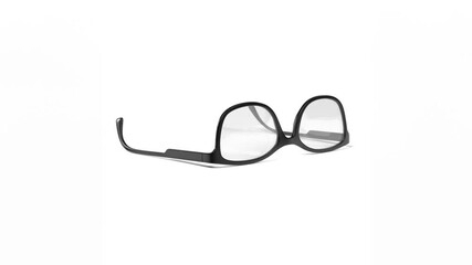 A pair of unique black eyeglasses with a distinctive design, showcasing a minimalist aesthetic.