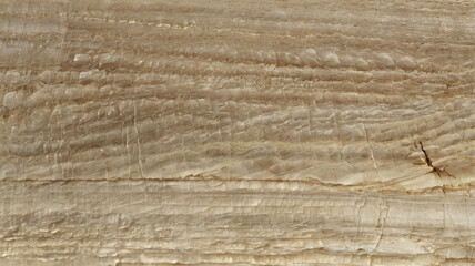 Rich layered onyx texture with flowing lines. Warm brown tones enhance natural beauty. Ideal for luxurious design applications. Perfect for elegant decor and sophisticated aesthetics.