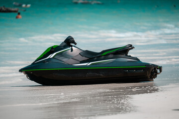 Jet ski wave rider on a beach with blue sea, holiday water sports