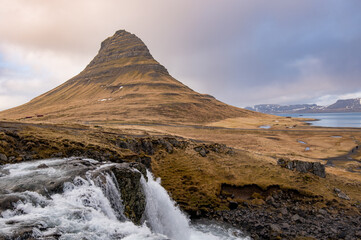 Kirkjufell mountain and the kirkjufellfoss waterfall at grundarfjordur at Snaefellsnes peninsula Iceland