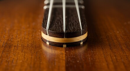 Ukulele Bridge Detail: Craftsmanship and Musical Instrument
