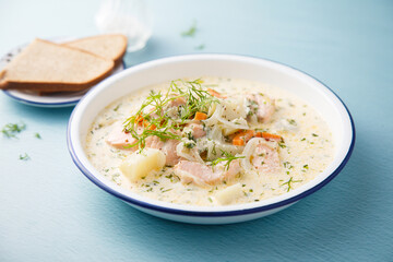 Salmon soup with cream and dill
