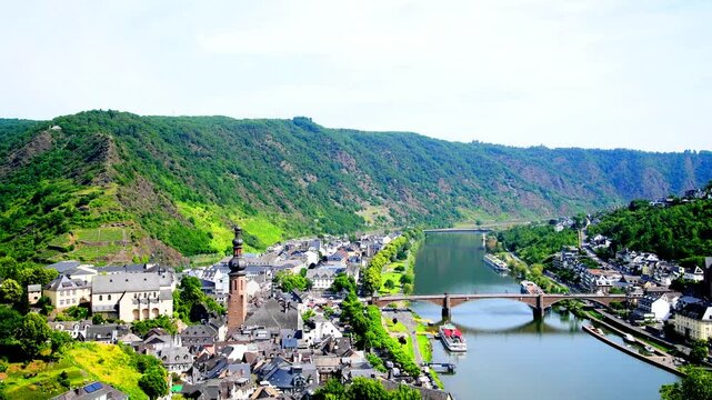 Cochem is a picturesque town located on the banks of the Moselle River in western Germany. It is famous for its stunning Reichsburg Castle, which overlooks the town from a hilltop.	