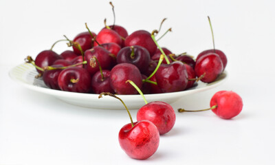 Cherries on a white background. Front view.