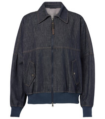 Denim jacket with pleated front detail and buttons isolated on a white background