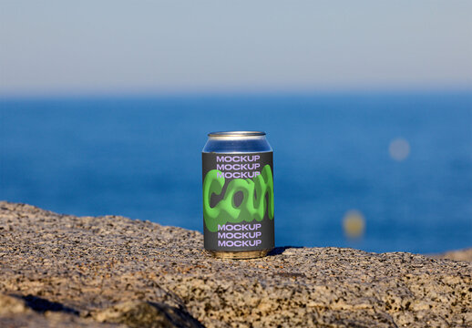 Mockup of a Blank Can on a Seaside Rock. PSD mockup template ready for your logo design