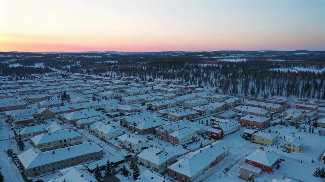 a view of a town with a lot of snow on the ground