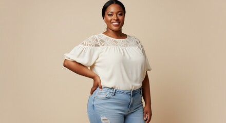 Confident Plus Size Black Woman Smiling in a Stylish Cream Lace Top and Light Blue Jeans
