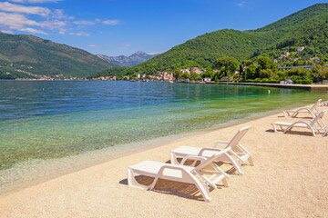 Beautiful sunny Mediterranean landscape. Beach vacation. Montenegro, Adriatic Sea. View of Bay of Kotor near Tivat city