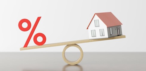 Wooden seesaw or scale with the percent sign and miniature house with the percent sign down on white background, concept of interest rates or mortgage, selective focus