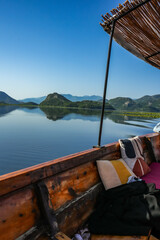 Mountains, water lilies and reeds on Skadar Lake, Montenegro – natural beauty of the Balkans