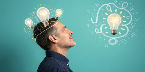 A Conceptual Image of a Man with an Open Head and Creative Lightbulbs Representing Innovative Thinking
