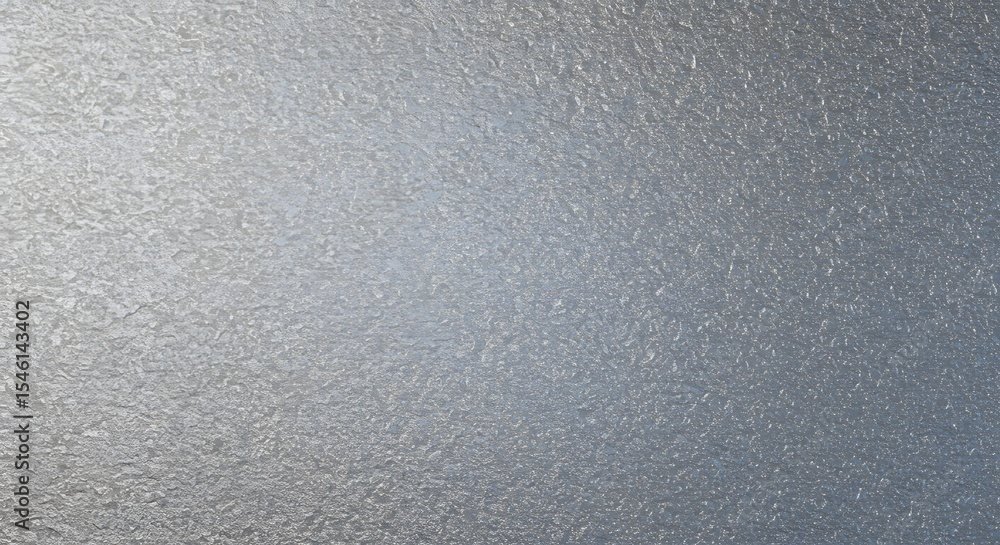 Poster close up of a textured silver surface with small bumps and variations in light reflection seen