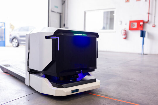 Autonomous mobile robot transporting goods in a warehouse using laser guided navigation