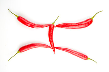 Red hot chili peppers on a white background. Vitamin vegetable food