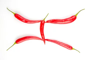 Gardinen Red hot chili peppers on a white background. Vitamin vegetable food © photosaint