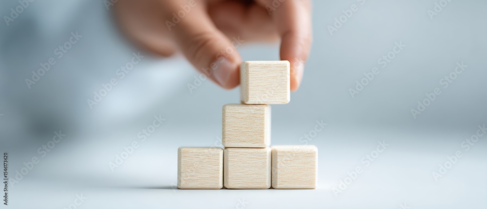 Poster building with wooden blocks a creative action in minimalist workspace with a focus on construction t