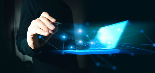hand of businessman interactive touching a holographic of transaction financial network data...