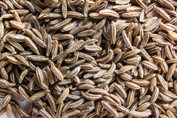 Extreme close-up of caraway seeds filling the entire frame