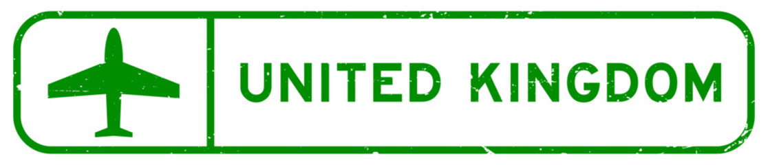 Fototapeta premium Grunge green united kingdom word with plane icon square rubber seal stamp on white background
