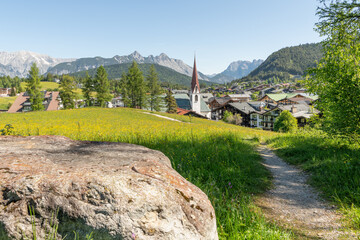 31 may 2025, Seefeld, Austria. View on Seefeld in Tirol village with beautiful church and houses....