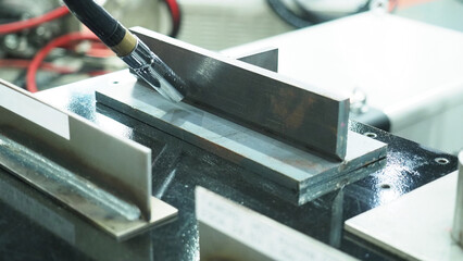 Laser welder.Close up of robot laser welding.
