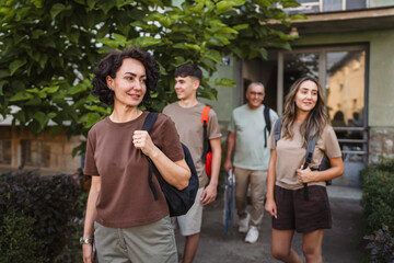 caucasian family with backpacks prepare to go, concept of family trip