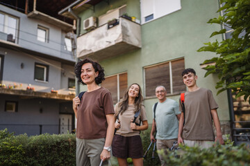 caucasian family with backpacks prepare to go, concept of family trip