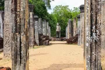 Fototapeta premium Ancient Ruins with Buddha Statue in Polonnaruwa, Sri Lanka