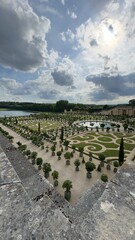Formal Garden with Pond and Trees from Elevated Stone Structure