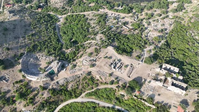 View from acropolis on top of mount to famous ancient Greek city Kaunos in Caria or Caunus in Roman period in Anatolia. Popular place for family travel on summer vacation. Dalyan, Mugla, Turkey
