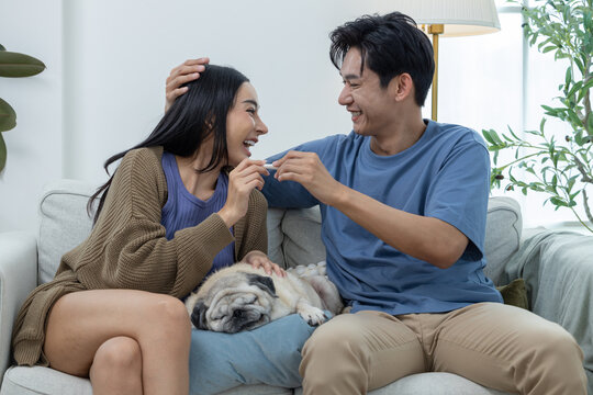 Couple Holding Positive Pregnancy Test - Powered by Adobe