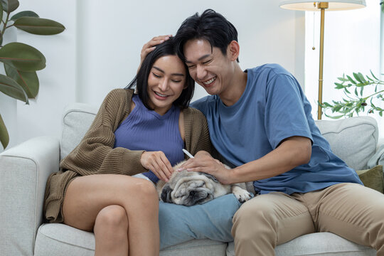 Couple Holding Positive Pregnancy Test