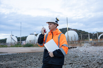 Engineers Conducting Night Inspection at Refinery
