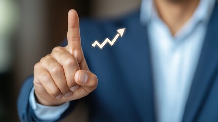 A businessman pointing upward to symbolize growth, success, and future potential in a professional environment.