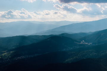 Majestic Carpathians mountain range under a cloudy sky during daytime