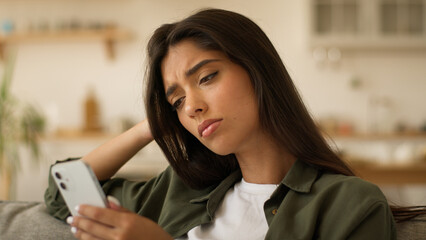 Boring sad upset frustrated stressed Arabian woman Indian girl female Hispanic lady exhausted...