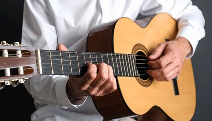 man playing acoustic guitar