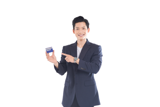Asian businessman holding credit card, confident expression, financial technology concept