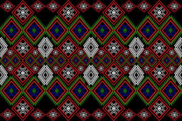 An intricate pixel art textile pattern featuring layered diamond motifs in vivid red, green, blue, and white on a black background. Inspired by traditional Southeast Asian tribal art and adapted for m