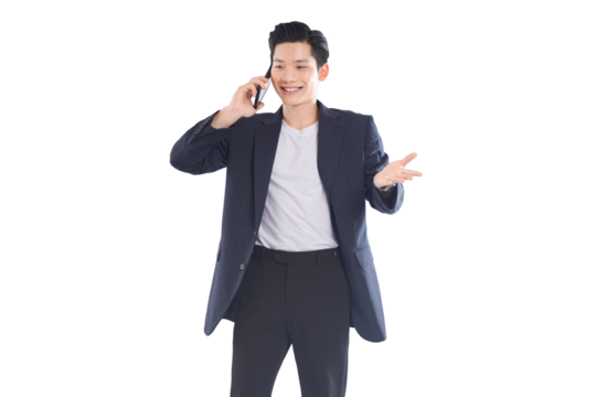 Asian businessman checking notifications, determined expression in modern office