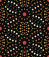 Seamless abstract floral pattern with dotted geometric flowers in orange, green, and blue on a black background. Dot art with small multicolor circles. Decorative vector illustration.
