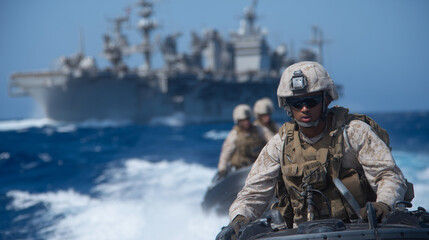 Naklejka premium Amphibious assault ship deploying hovercraft with troops and vehicles